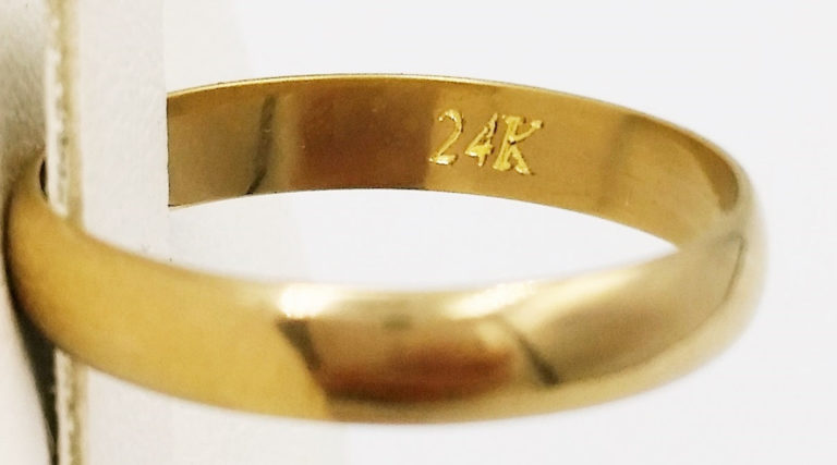 Que représente le poinçon sur les bijoux en or
