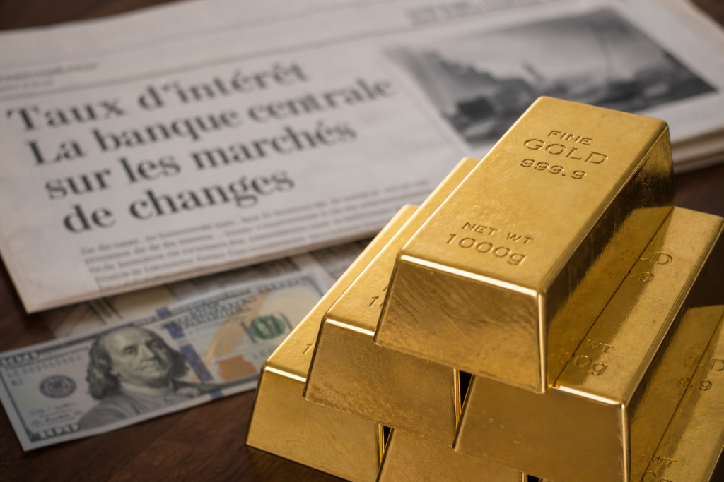 L’or progresse alors que le dollar recule et que les hausses de taux semblent moins probables